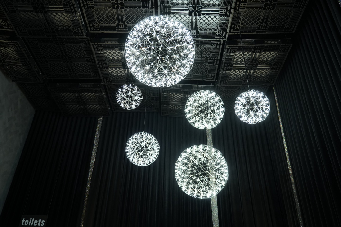 Tomiachi venue photograph showing illuminated sculptural spheres