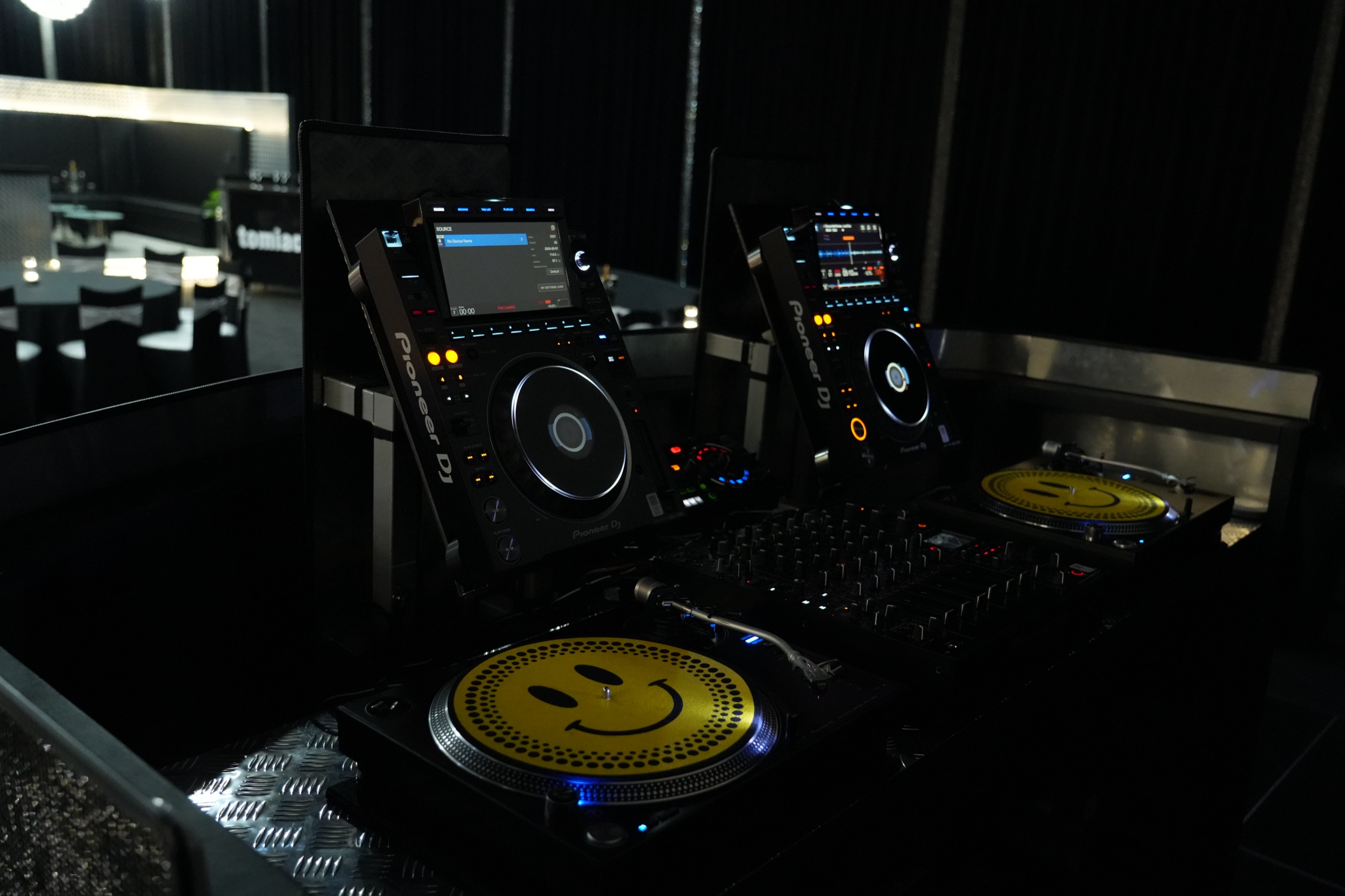 Professional Pioneer DJ equipment set up inside Tomiachi
